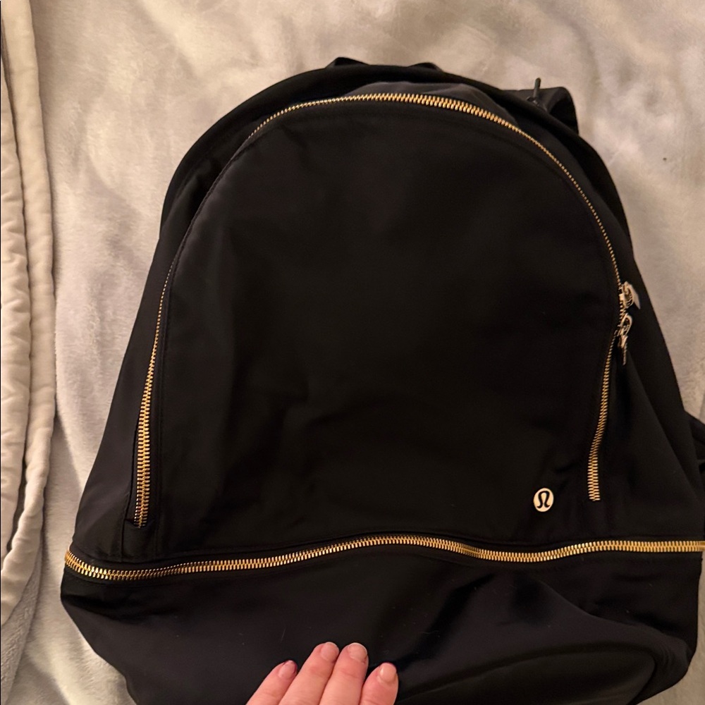 lululemon athletica Black Backpack with Gold Zippers